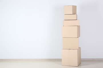 Cardboard boxes on grey background
