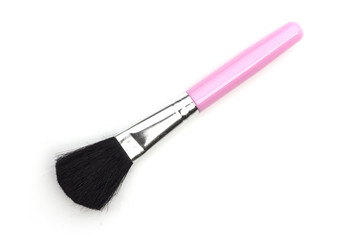 Pink makeup brush isolated on white background.