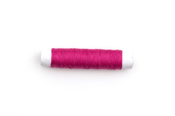 pink threads isolated on white background.