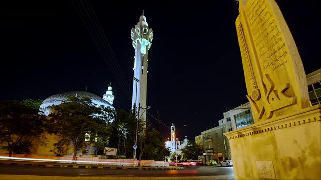 King Abullah the 1st Mosque in center Amman, Masjed Al Malek Abdullah. Jordan. Wide shot dolly right, Hyperlapse with movement at night for Mosque and church. 4K