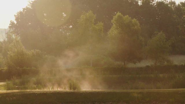 Fog over the pond at sunrise