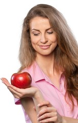 Young woman holding an apple