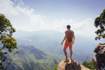 Traveler man enjoy mountains landscape on Ella Rocka, Sri Lanka. Travel concept