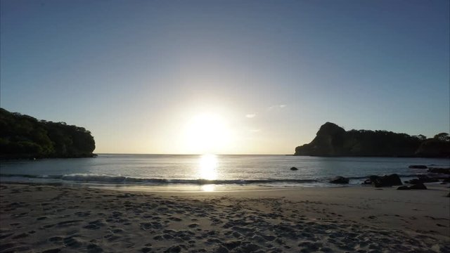 Beach sunset  Sunset timelapse. Timelapse of sunset on a beach cove on the Nicaragua&sbquo;&Auml;&ocirc;s 'Emerald Coast' on the Pacific.