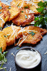 cheesy pumpkin fritters, vertical, close up