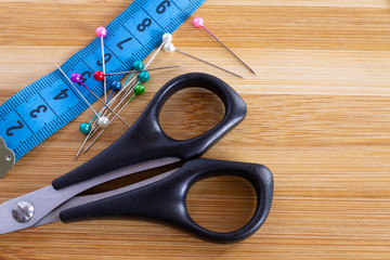 Sewing accessories on wooden table