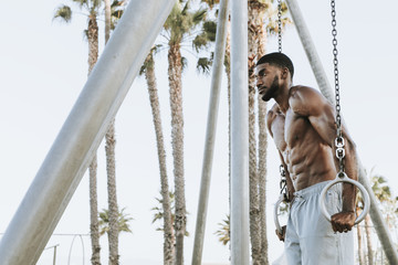 Fit man working out at the beach