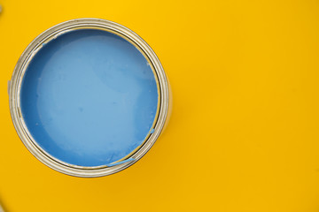 Tools for repair on plain yellow background