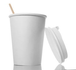 Eco-friendly white paper cup with lid and drink stick isolated on white
