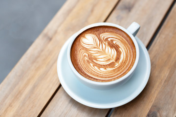 A cup of cappuccino with latte art