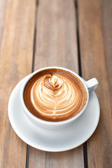 A cup of cappuccino with latte art