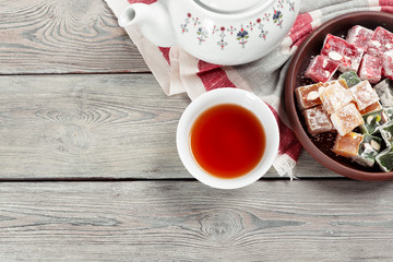 Turkish delight on a wooden table.