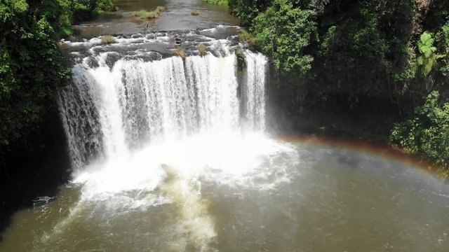 4k cinematic pan of the powerful Tad Champee waterfall in the Bolaven plateau in Laos, Southeast Asia.