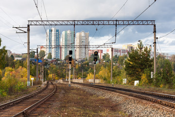 Naklejka premium electrified railway near the city