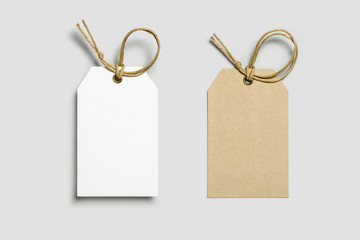 Blank tag tied for hang on product for show price or discount isolate on white background with...
