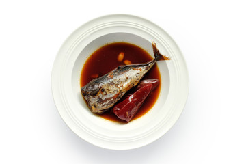 Boiled mackerel thai food in white dish on white background.