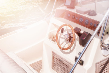 Captain wheel on the luxury white yacht