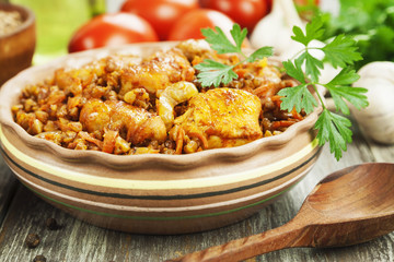 Buckwheat porridge with meat and tomato sauce