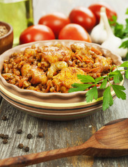 Buckwheat porridge with meat and tomato sauce