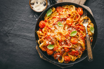 Tomato sauce spaghetti pasta on pan