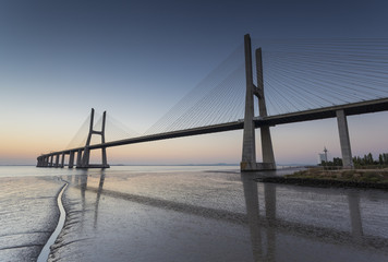 Vasco da Gama Bridge over Tagus River in Lisbon, Portugal, at sunrise