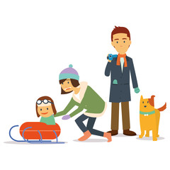 Family holiday in winter playing ski with dog