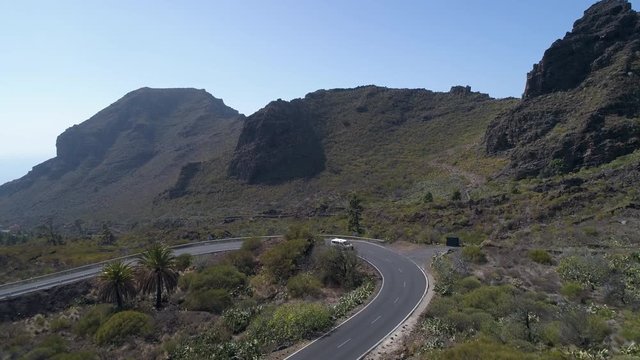 Aerial - Flyover road curve located in Western coast of Tenerife island