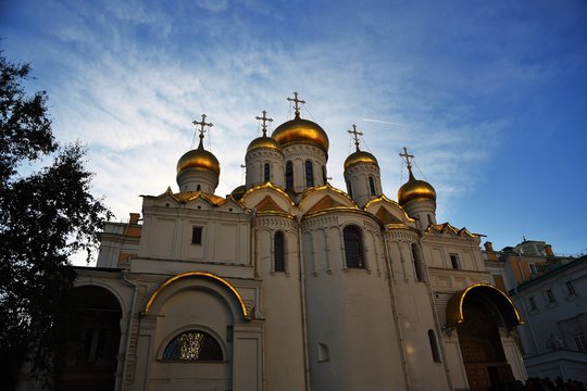 Annunciation church of Moscow Kremlin. Popular landmark. Blue sky background. Color photo.