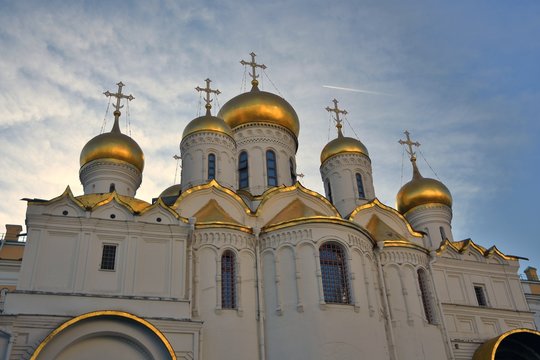 Annunciation church of Moscow Kremlin. Popular landmark. Blue sky background. Color photo.