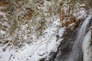 frozen water cascade in the winter 