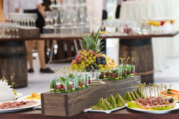 Snacks on served banquet table