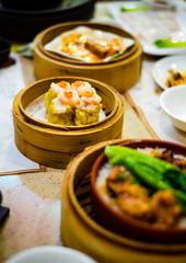 Chinese Cantonese dimsum meal served in bamboo steamer