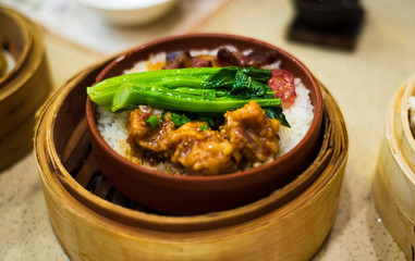 Chinese Cantonese dimsum meal served in bamboo steamer