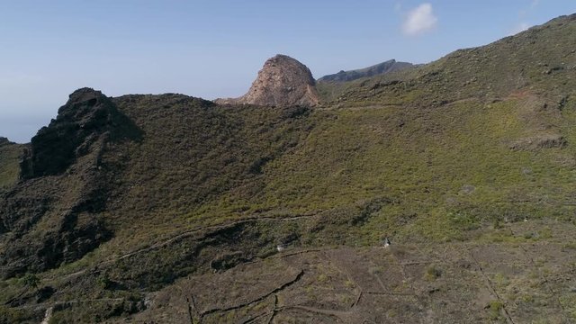 Aerial - Flying near typical rocky hills in Western coast of Tenerife