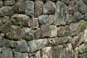 stone wall background with selective focus