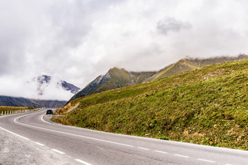 Beautiful landscapes with high mountains of Georgia, road bump, mountain road