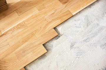 Subfloor mixture and assembled parquet plates - obrazy, fototapety, plakaty