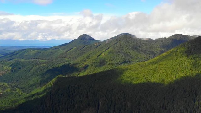 Washington State USA mountain range with low clouds