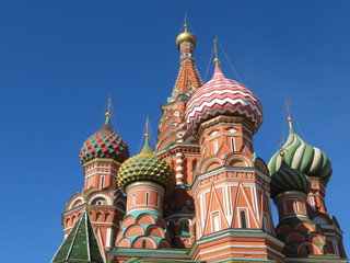 Fototapeta na wymiar St. Basil's Cathedral isolated on clear blue sky background. Russian architecture landmark, located on Red square in Moscow