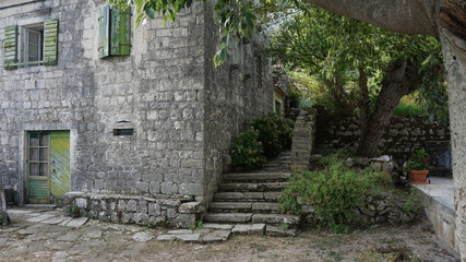 Naklejka premium old stone stairs in garden