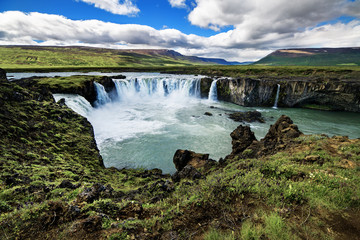 Fototapeta na wymiar Amazing waterfalls in a beautiful Iceland landscape.