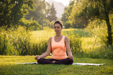 girl doing yoga outdoors