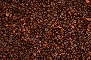 Coffee beans background. Top view. Coffee beans texture.