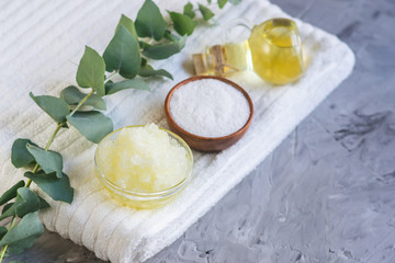 Natural Ingredients Homemade Body Oatmeal Sea Salt Scrub with Olive Oil Honey Milk White Towel Beauty Concept Skincare Organic Aroma Spa Therapy © milenie
