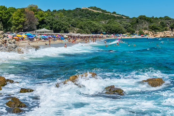 Fototapeta premium Olympiada, Greece - August 11, 2018: Proti Ammoudia beach, one of the most beautiful beaches in the Aegean Sea.