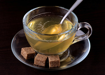 green tea cup on dark background