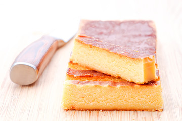 pieces of yolk nougat on golden background