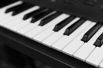 Synthesizer piano key board top view.Professional electronic midi keyboard with black and white...