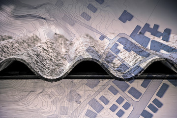 Asbestos, one of the most dangerous construction materials, on the roofs of our buildings - concept...