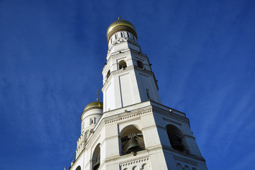 Ivan Great Bell tower of Moscow Kremlin. Popular landmark. Blue sky background. Color photo.